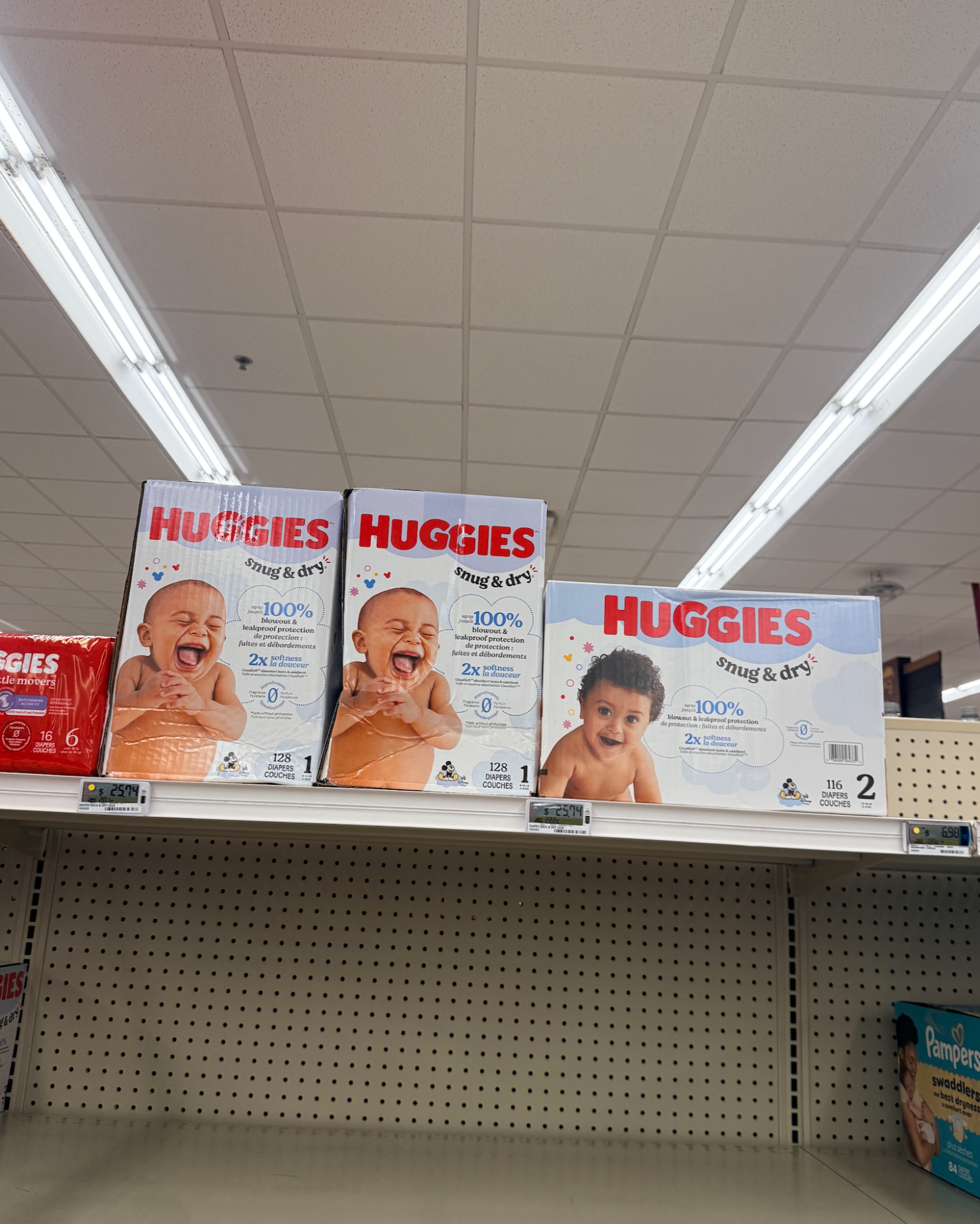 Boxes of diapers on a shelf at a military exchange, featured in a guide to the WIC Overseas Program for military families.