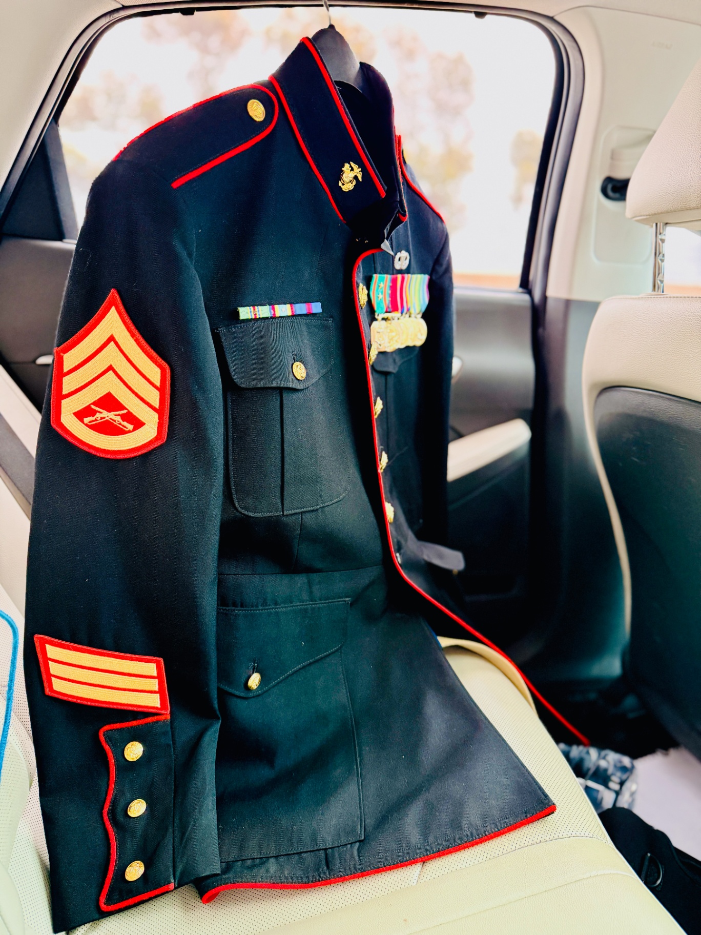 A U.S. Marine Corps dress blue uniform on the way to the Marine Corps Ball, featured in a guide to Marine Corps family support.