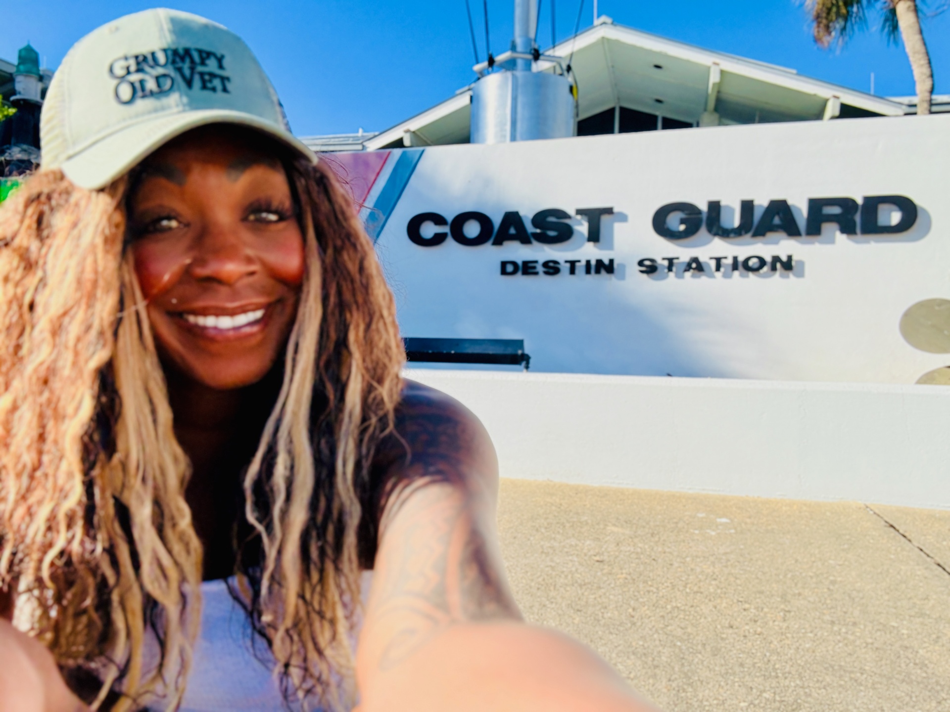 Tiffany Orner of The TO Agency outside U.S. Coast Guard Station Destin, featured in a guide to Coast Guard family support.